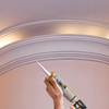 Cornice Adhesive is an off white, high strength, flexible, low shrinkage ready mix paste adhesive 